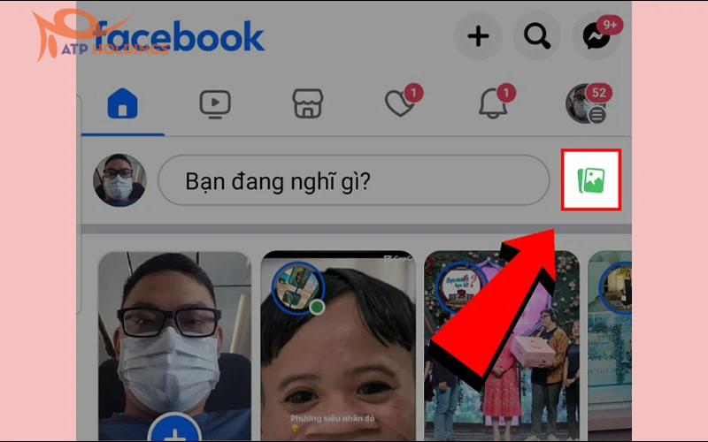 Chọn biểu tượng đăng ảnh trên Facebook.